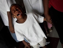 Boy Mourning After Hurricane Katrina