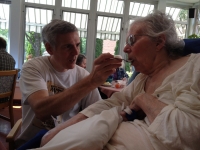 My brother feeding my mother